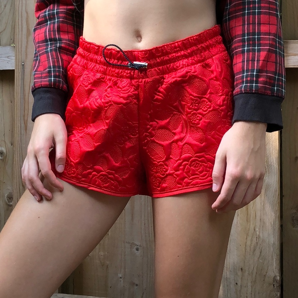 Red adidas shorts